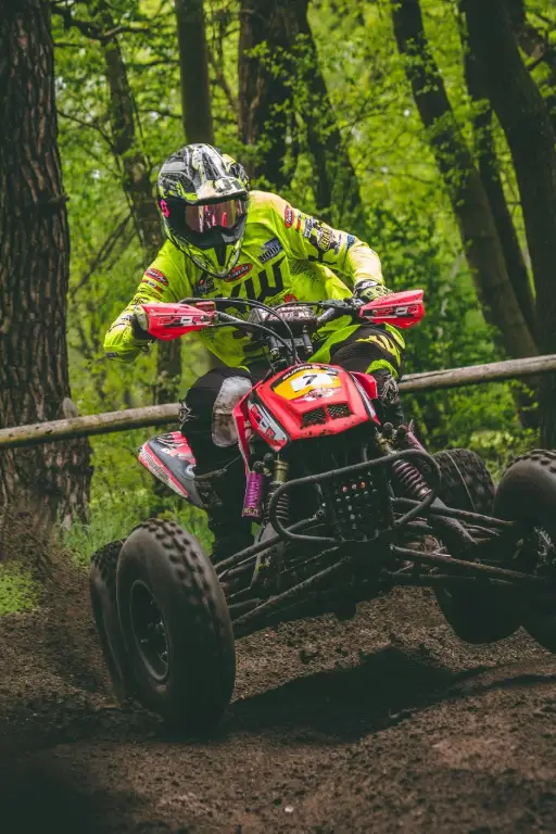 Quad drifting in the mud